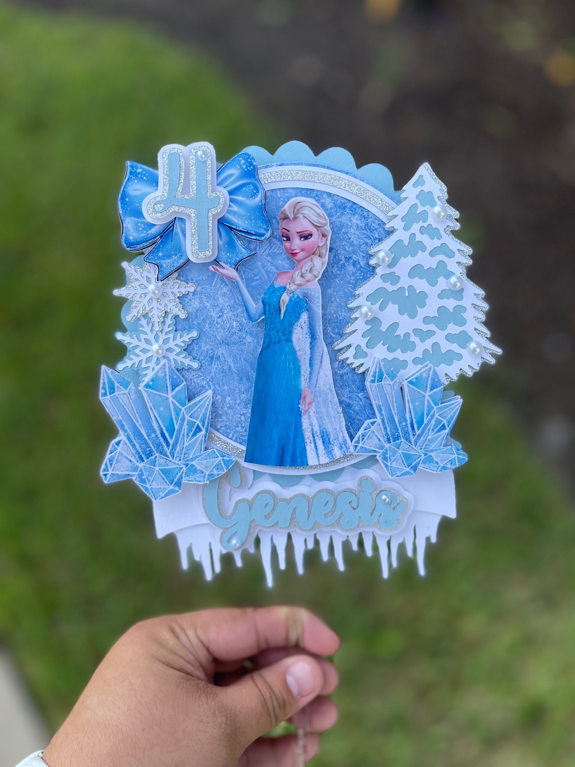 Frozen-themed cake topper. Frozen-inspired topper decoration for parties. Frozen decoration for party.  Sparkling Frozen-themed party decoration. Custom Frozen-themed cake topper . Frozen-inspired  party prop. Shimmery cake topper Elsa themed.