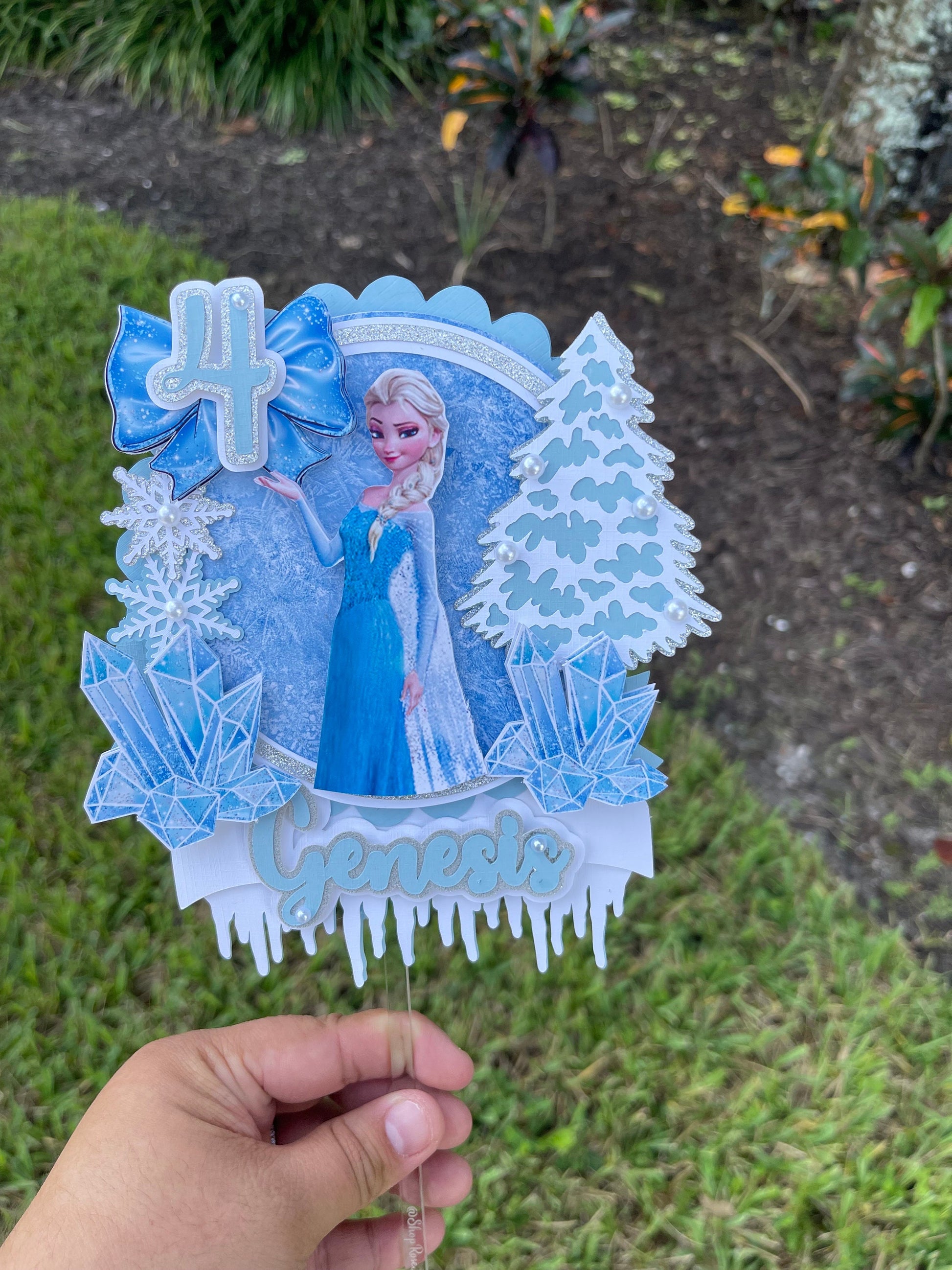 Frozen-themed cake topper. Frozen-inspired topper decoration for parties. Frozen decoration for party.  Sparkling Frozen-themed party decoration. Custom Frozen-themed cake topper . Frozen-inspired  party prop. Shimmery cake topper Elsa themed.