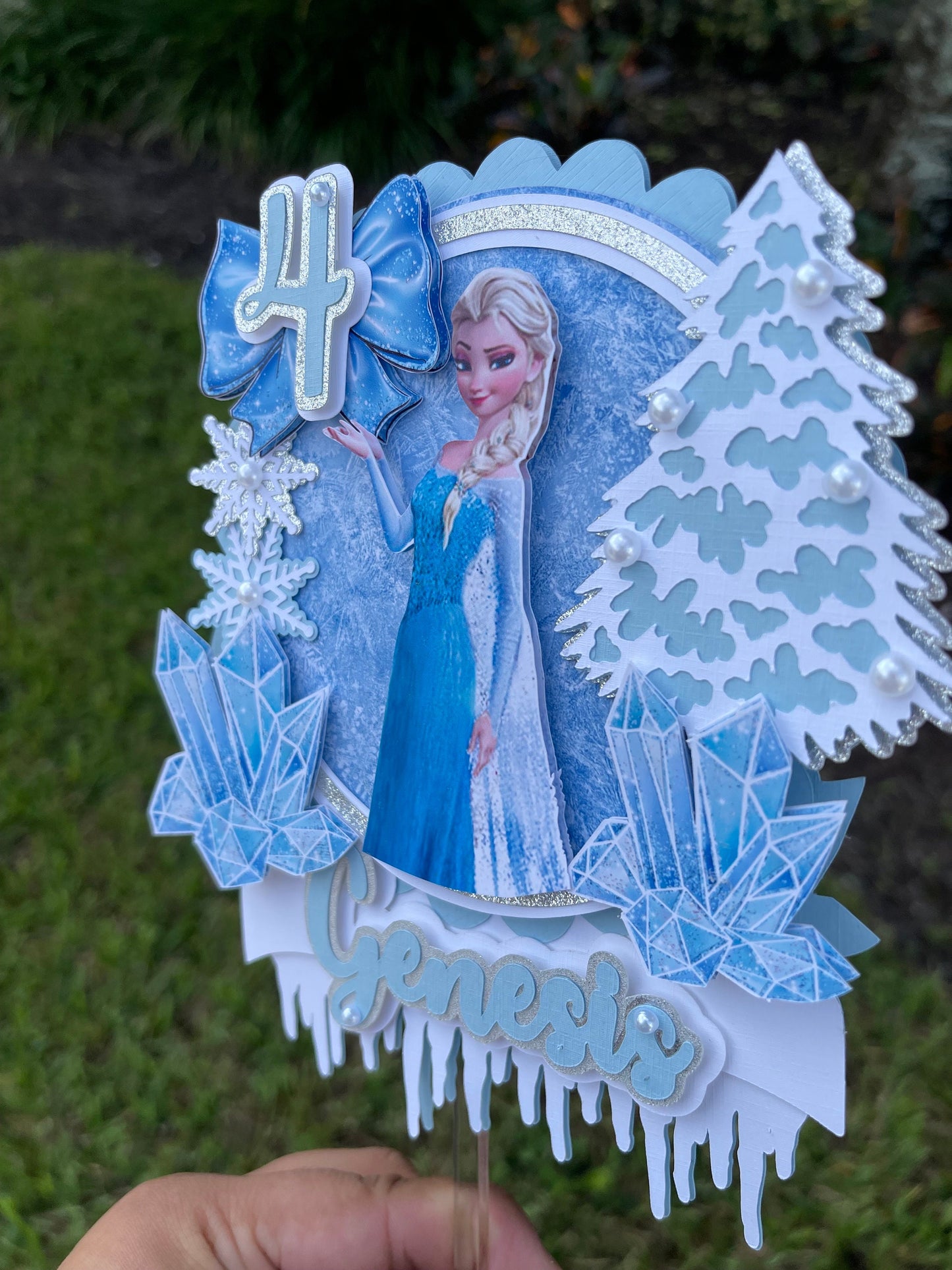 Frozen-themed cake topper. Frozen-inspired topper decoration for parties. Frozen decoration for party.  Sparkling Frozen-themed party decoration. Custom Frozen-themed cake topper . Frozen-inspired  party prop. Shimmery cake topper Elsa themed.