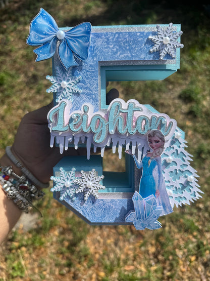 3D Frozen-themed letter party prop. Frozen-inspired letter decoration for parties. Frozen letter prop for themed celebrations. Sparkling Frozen-themed party decoration. Custom Frozen-themed party prop. Frozen-inspired 3D party prop.3D Number .